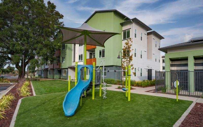 a playground in front of a building